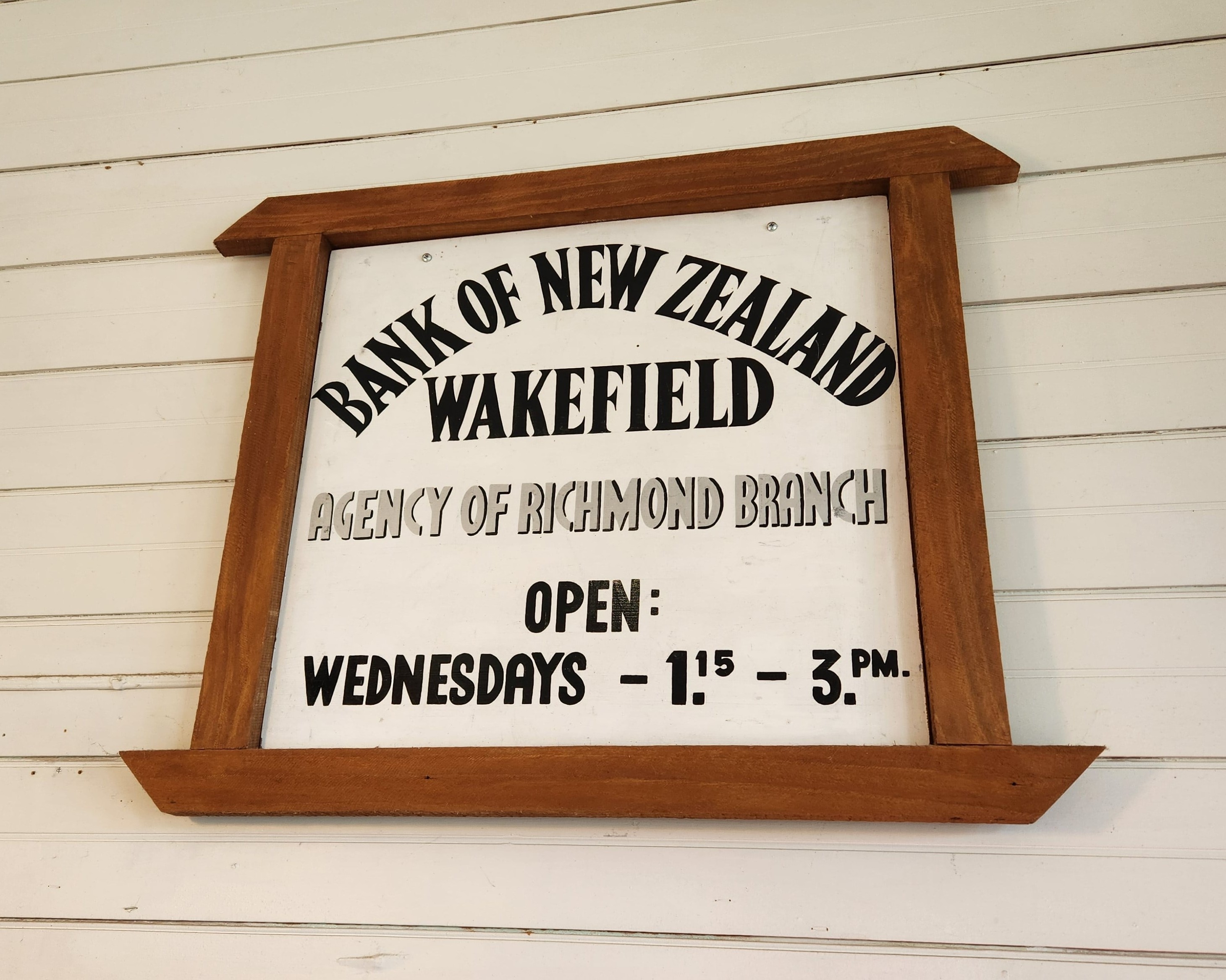Picture of the a Bank of New Zealand Agency of Richmond sign in the Java Hut café in Mapua.