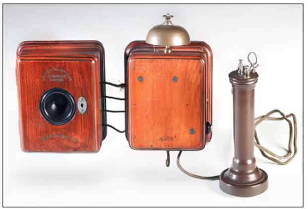 Black and white photo of the original Wakefield School Cob building with additions.